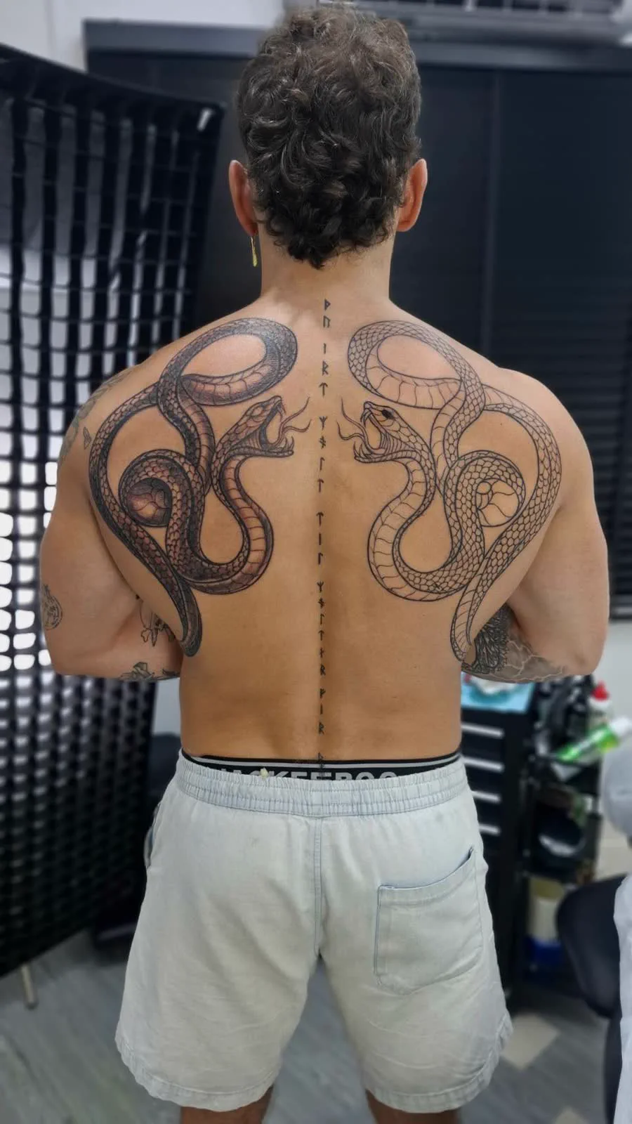 Twin serpent full back tattoo, black and grey, Savatang Tattoo Samui