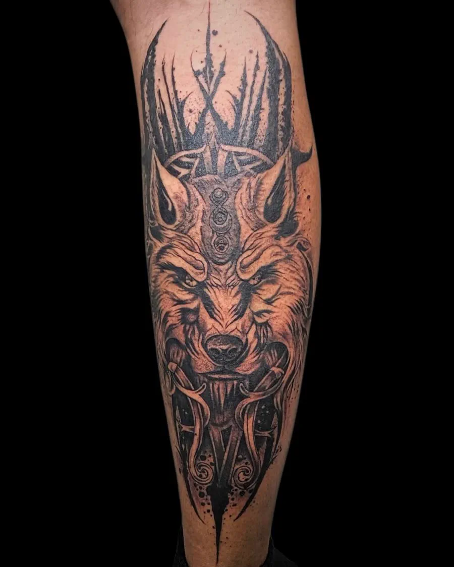 Antlered wolf leg tattoo, black and grey, Koh Samui