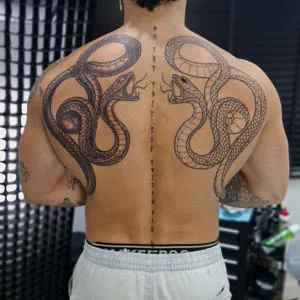 Twin serpent back tattoo by Savatang